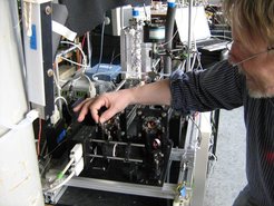 Person works on measuremnt instrument