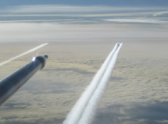 Contrails from an A340 aircraft. Photo taken from the cockpit of the Falcon during the CONCERT campaign on 19 November 2008 (Voigt et al., 2011)
