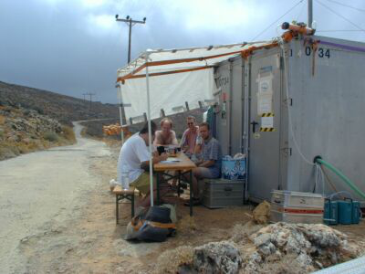 The group in front of the container