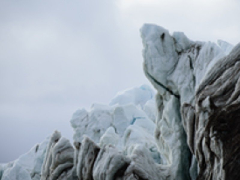 Ice cliff of the retreating Blomstrandbreen glacier on Spitzbergen.