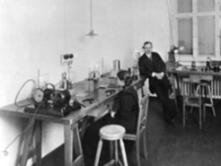 Lise Meitner and Otto Hahn in their Berlin laboratory about 1909.