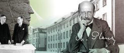 Two men behind a desk appear next to a large carved stone face, with a historical building and abstract lines in the background. Max Planck featured on the right.