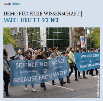 Newsletter front page 2/2017. Demonstrators in Frankfurt hold banners promoting science and facts during a march for free science.