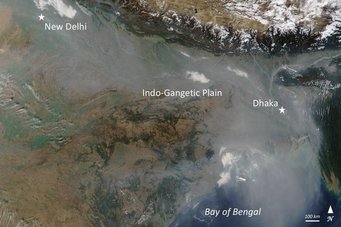 An enormous cloud of pollution over South Asia: The Atmospheric Brown Cloud is created during the winter months every year by the combustion of biomass and fossil fuels. Source: NASA, Jeff Schmaltz, LANCE/EOSDIS Rapid Response Satellite image depicting the Indo-Gangetic Plain with visible smog, marking New Delhi and Dhaka. The Bay of Bengal is at the bottom right.