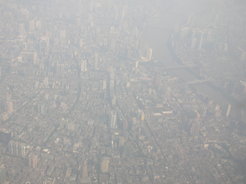 Multiphase buffering effect of emitted ammonia controls aerosol pH, thereby influencing the haze chemistry and formation of aerosol particles, especially nitrate, sulfate and ammonium. It shows a close link between the nitrogen cycle and atmospheric chemistry. The picture shows a hazy day in Guangzhou, China. Source: Ulrich Pöschl, MPI for Chemistry