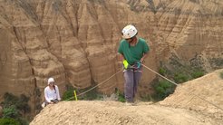 Charlotte Prud'homme (pictured left) is abseiling to collect soil samples in the 80-meter-thick sedimentary sequence in Charyn Canyon, Kazakhstan.