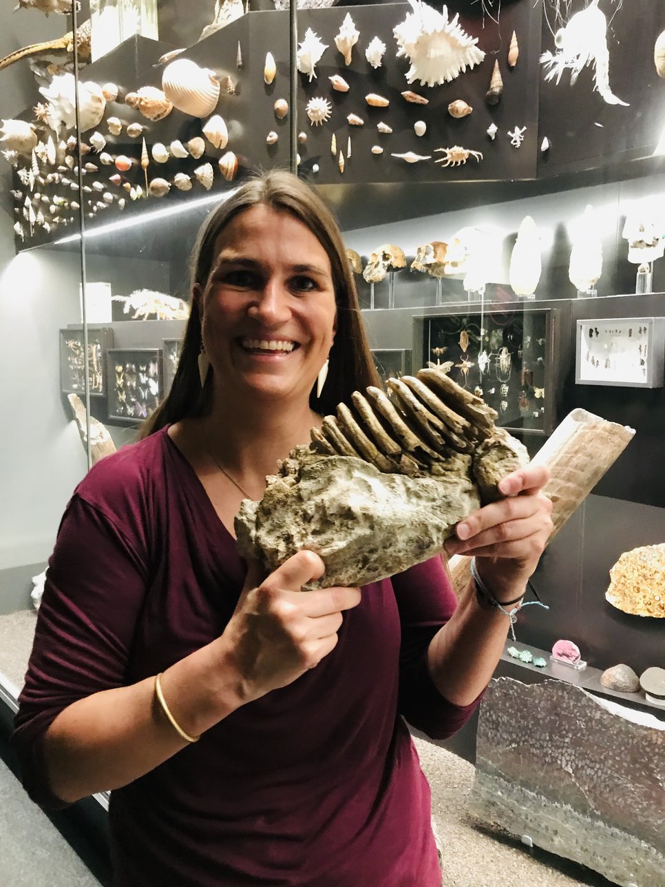 Geochemist Dr Tina Lüdecke holds the two-million-year-old molar of an elephant from Malawi.