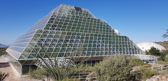 In Biosphere 2 researchers (see picture) undertook the largest tracer experiment to date on how H2O, CO2 and VOCs flow through drought-stressed plants and soil. Blue sky, artificial rainforest, synthetic ecosystem encased in a glass and metal spaceframe. In Biosphere 2 researchers (see picture) undertook the largest tracer experiment to date on how H2O, CO2 and VOCs flow through drought-stressed plants and soil.