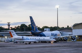 Arrival of the research aircraft HALO in Manaus, Brazil. Two planes in front of a hangar. Arrival of the research aircraft HALO in Manaus, Brazil.