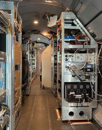Preparing the HALO research aircraft in the hangar in Oberpfaffenhofen for the measurement campaign: Clearly visible are inlet openings for the measuring equipment on the upper side of the fuselage of the aircraft. HALO, measuring instruments, on board
