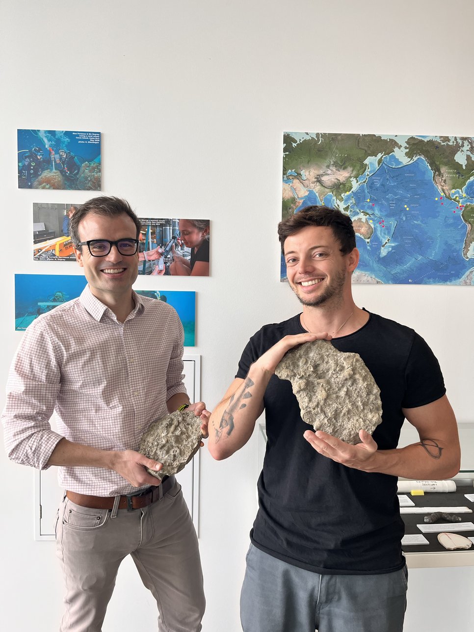 Alfredo Martínez-García (left) and Jonathan Jung (right) with Paleozoic coral samples